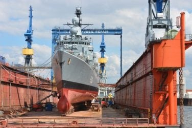 Image of a ship under construction or repair, representing the asbestos historically used in ship construction, the mesothelioma from Bender Shipbuilding and Repair Company past employment, and how Nemeroff Law Firm will fight for your right to compensation.