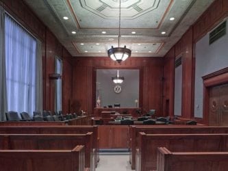 Image of the inside of a courtroom, representing the importance of working with an experienced mesothelioma trial attorney when you or a family member suffer from an asbestos-related disease. Nemeroff Law Firm asbestos trial attorneys fight for their clients in courtrooms across the country.
