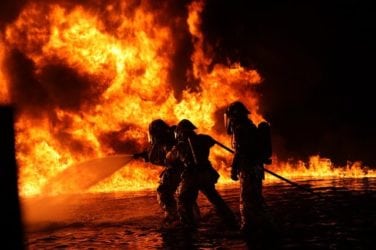 Image of firefighters battling a blaze, representing the seriousness of burn injuries and how an experienced attorney from the Nemeroff Law Firm will fight for your rights after a burn injury.