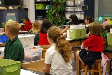 Nemeroff Law Firm uses this photo of children in a classroom to represent the contrast between what we think our children are getting at school, a safe education, versus what they could be getting, asbestos exposure in Pennsylvania elementary schools.