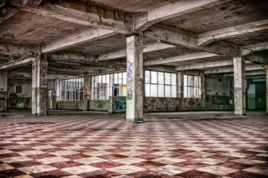A photo of an old factory representing the asbestos-filled workplace of the plaintiffs in Tooey v. AK Steel and how the lawyers at Nemeroff Law Firm helped these mesothelioma victims and are ready to put that experience to work for you.