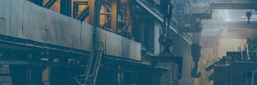 Image of a dull industrial site, representing exposure to asbestos in various industries and locations and how the experienced and compassionate attorneys at Nemeroff Law Firm can help when you or a loved one is suffering from mesothelioma cancer due to asbestos exposure.